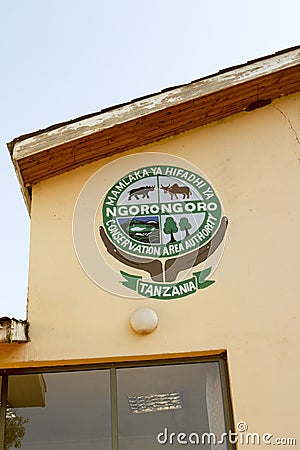 Ngorongoro Conservation Area emblem on wall, Tanzania Editorial Stock Photo