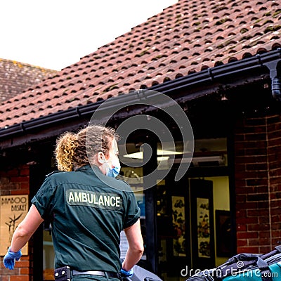 NHS Ambulance Paramedic In Uniform On An Emergency Call Editorial Stock Photo