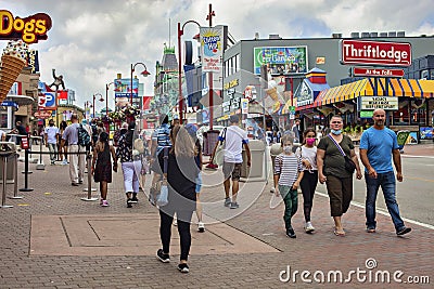 Niagara Falls after the COVID-19 epidemic . The central street of the city is filled with tourists Editorial Stock Photo