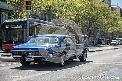classic car, Mercury Cougar XR7 in blue color on the streets of the European city Editorial Stock Photo