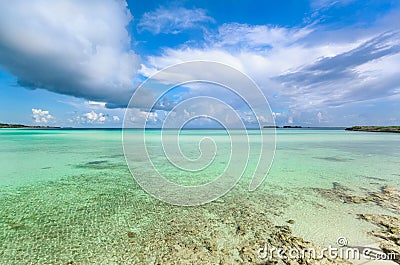 Nice beautiful inviting view of turquoise tranquil ocean and blue sky background at Cayo Guillermo island, Cuba on sunny gorgeous Stock Photo