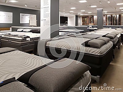 Nice beds and mattresses for sale at store Macy`s Editorial Stock Photo