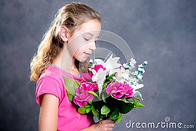 Nice blond girl bouquet of flowers Stock Photo