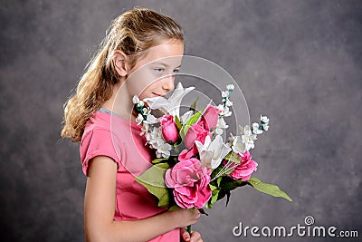 Nice blond girl bouquet of flowers Stock Photo