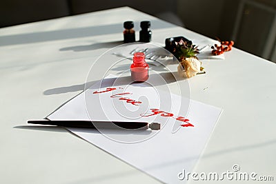 Nice calligraphic card with red inscription I love you on white Stock Photo