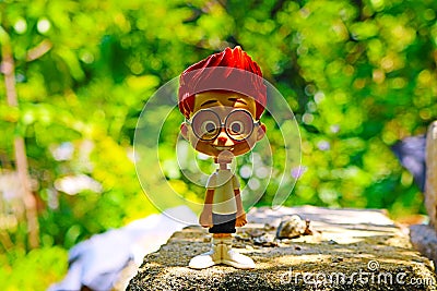 Cartoon character of school boy toy image Editorial Stock Photo