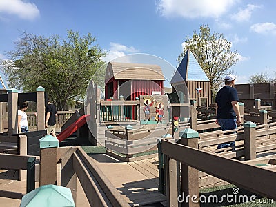 Nice children playground in plaza Editorial Stock Photo