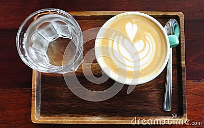 Nice coffee on wooden tray Stock Photo