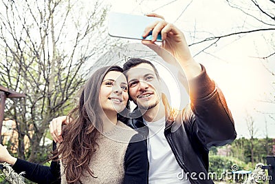 Nice couple relaxes and enjoys putting their hands up Stock Photo