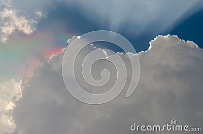 Nice dramatic sky, Iridescence light over clouds with sun ray shine Stock Photo