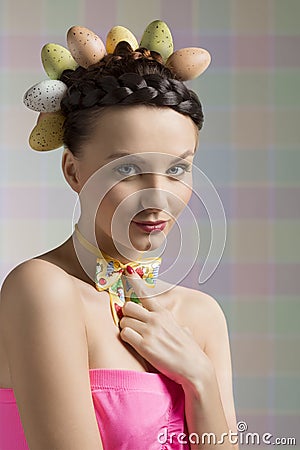 Nice easter girl with eggs on head Stock Photo