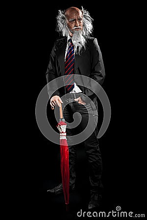 Nice elegant oldman model in classic suit posing Stock Photo