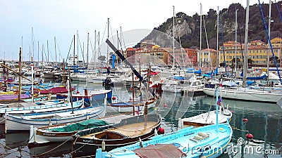 NICE, FRANCE - APRIL 2015: Colorful boats in the port of Nice, Cote d`Azur, French Riviera, France. Editorial Stock Photo