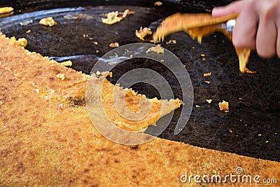 Nice, France, 25th of February 2020: Farinata or Cecina or Torta di ceci thin unleavened pancake Stock Photo