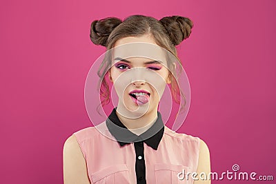Nice funny model woman with fashion makeup on bright pink background Stock Photo