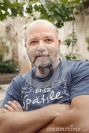 Nice guy bearded male man portrait in the backyard Stock Photo