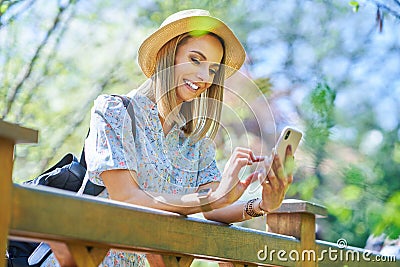 A nice and happy girl with smarfone Stock Photo