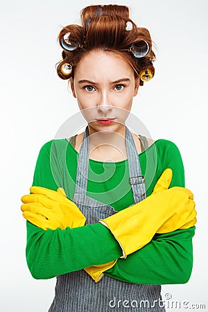 Nice housewife looks straight at camera holding hands Stock Photo