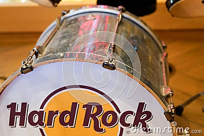 Hard Rock Cafe text sign and brand logo branch of legendary international chain on musical bass Editorial Stock Photo