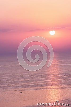 Nice pink sunset seascape in pastel shades, peace and calm outdoor travel background Stock Photo