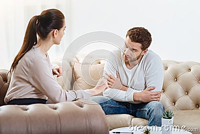 Nice pleasant couple talking to each other Stock Photo
