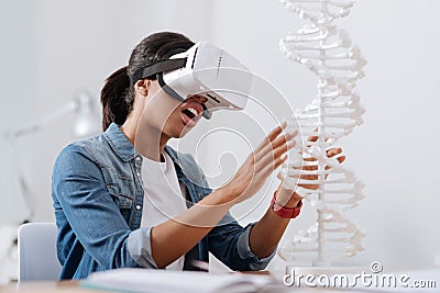 Nice pleasant woman studying microbiology Stock Photo