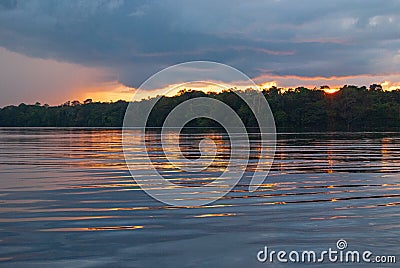 Nice postcard a sunset or sunrise in the Amazon river of South America Stock Photo