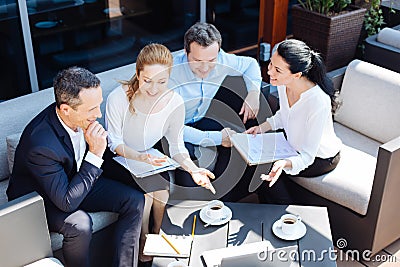 Nice professional businesspeople having a meeting Stock Photo