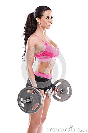 Nice woman doing workout with big dumbbell, retouched Stock Photo