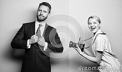 Nice shot. Fame and success. Businessman enjoy star moment. Photographer taking photo successful businessman. Paparazzi Stock Photo