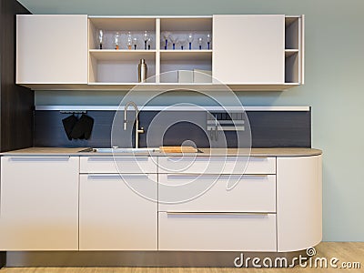 Nice small beige kitchen kitchenet with sink Stock Photo