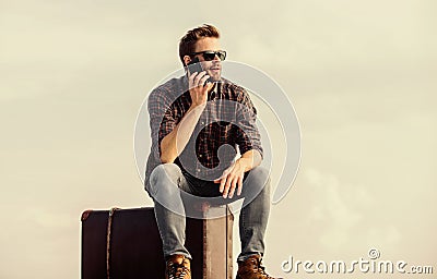 Nice talk. traveler wait for taxi. Move. male fashion style. looking so trendy. businessman in glasses. business trip Stock Photo