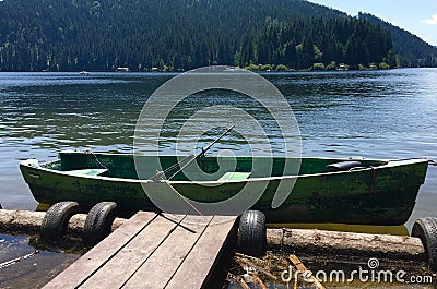 Old boat on Belis Lake, Cluj, Transylvania Stock Photo