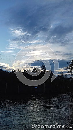 Nice village view with water and sky. Stock Photo