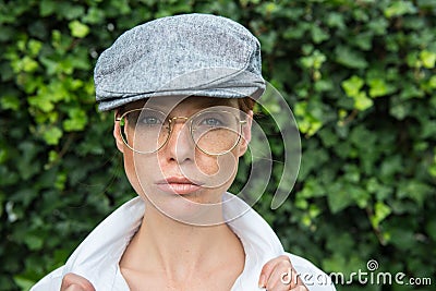 Nice woman dresses up as a man in the twenties years style Stock Photo