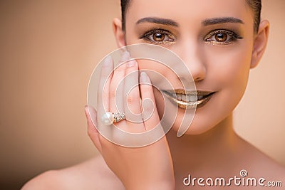 The nice woman wearing elegant jewellery Stock Photo