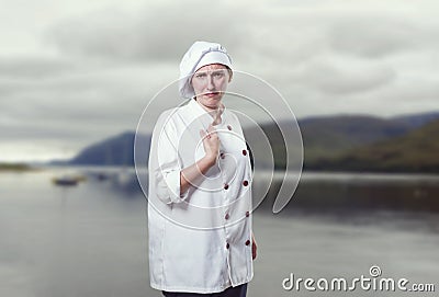 Nice young woman chef Stock Photo
