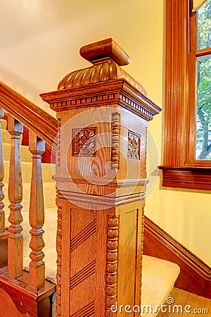 Nicely curved wooden stairway. Stock Photo