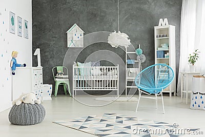 Nicely furnished baby boys room Stock Photo