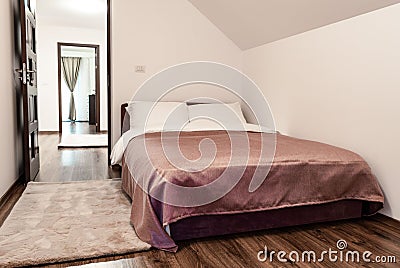 Nicely furnished bedroom Inside a modern house, flat Stock Photo