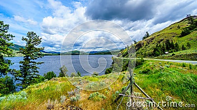 Nicola Lake and the Nicola Valley under Cloudy Skies Stock Photo