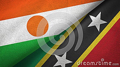 Niger and Saint Kitts and Nevis two flags textile cloth, fabric texture Stock Photo