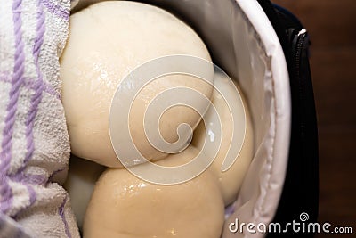 Nigerian pounded yam kept in food warmer before eating Stock Photo
