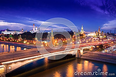 Night aerial panorama to Bolshoy Moskvoretsky Bridge, towers of Moscow Kremlin and Saint Basil Cathedral Stock Photo