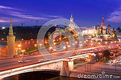 Night aerial panorama to Bolshoy Moskvoretsky Bridge, towers of Moscow Kremlin and Saint Basil Cathedral Editorial Stock Photo