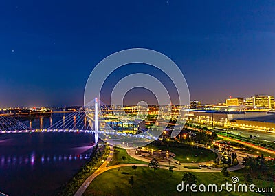 Night aerial view of Omaha Plaza, the landing pad of the Bob Kerrey foot bridge in Omaha Nebraska Stock Photo