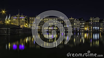 Night Amsterdam cityscape reflection in the lake with houses, lights, and starry sky background Editorial Stock Photo