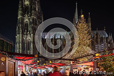 Night atmosphere of Weihnachtsmarkt, Christmas Market in KÃ¶ln. Editorial Stock Photo