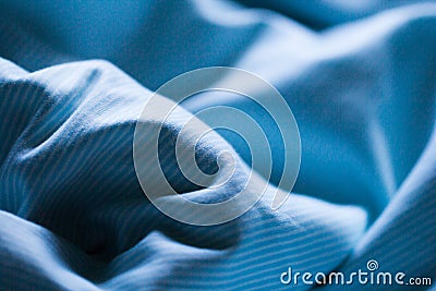 Night blue sheet on the sleep bed Stock Photo