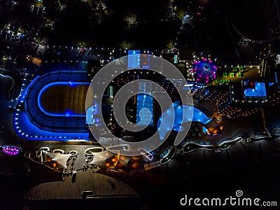 Night bright hotel with dolphin shaped pool Editorial Stock Photo